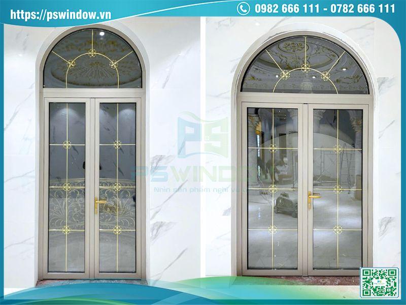 Mẫu cửa nhôm mở quay 2 cánh uốn vòm kính nan đồng