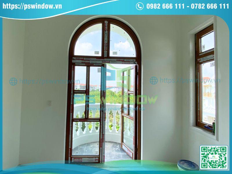 Mẫu cửa nhôm uốn vòm chia ô màu vân gỗ Mẫu cửa nhôm uốn vòm chia ô màu vân gỗ