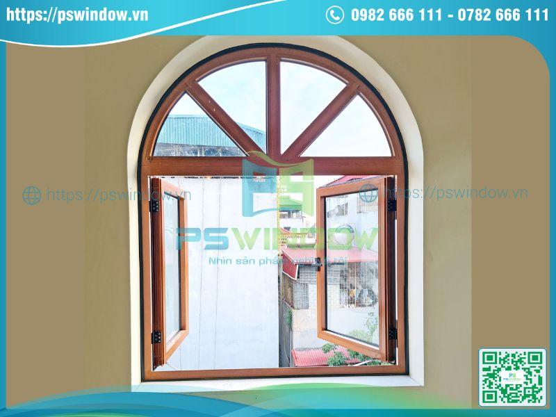 Mẫu cửa sổ Xingfa mở quay uốn vòm màu vân gỗ Mẫu cửa sổ Xingfa mở quay uốn vòm màu vân gỗ