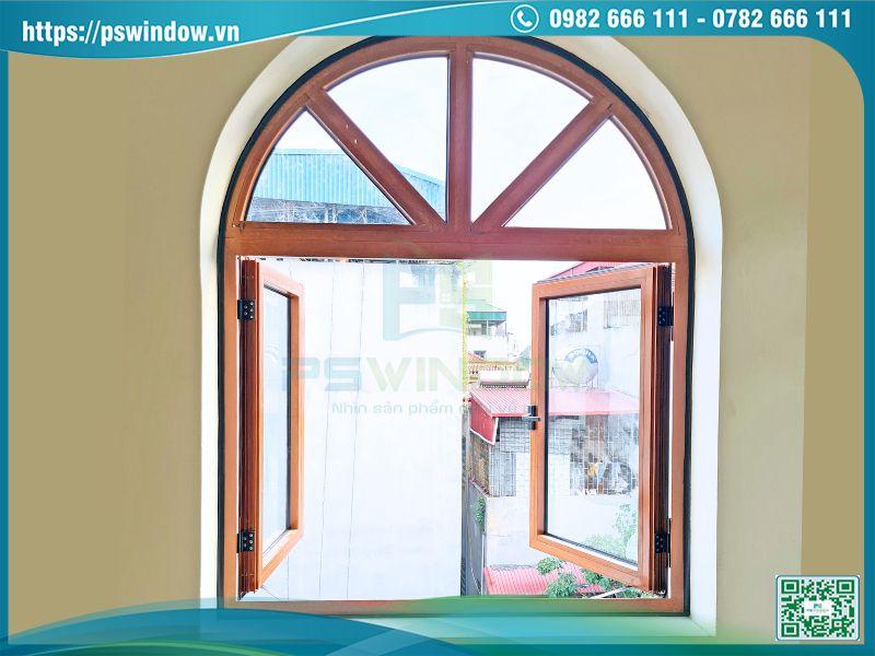 Mẫu cửa sổ mở quay uốn vòm khung nhôm Xingfa vân gỗ